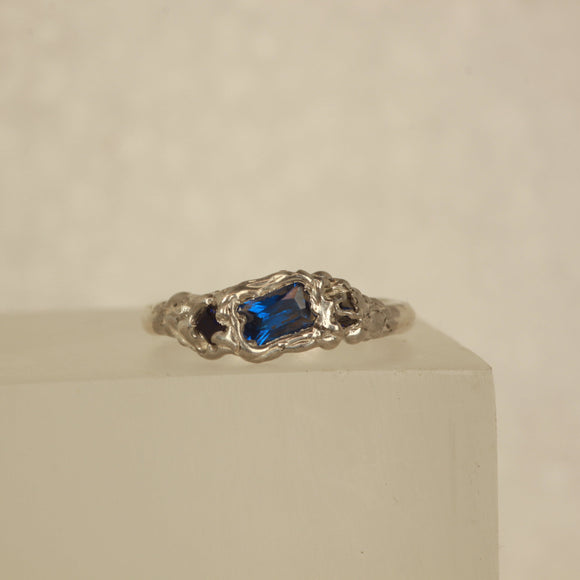 blue lab grown spinel melted silver ring