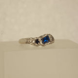 blue lab grown spinel melted silver ring